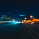 Image of blurred lights simulating driving drunk on the highway at night